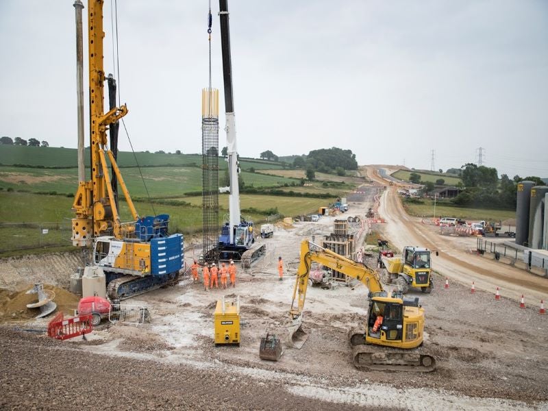 HS2 Wendover Dean Viaduct foundation works with piling rigs and cranes.